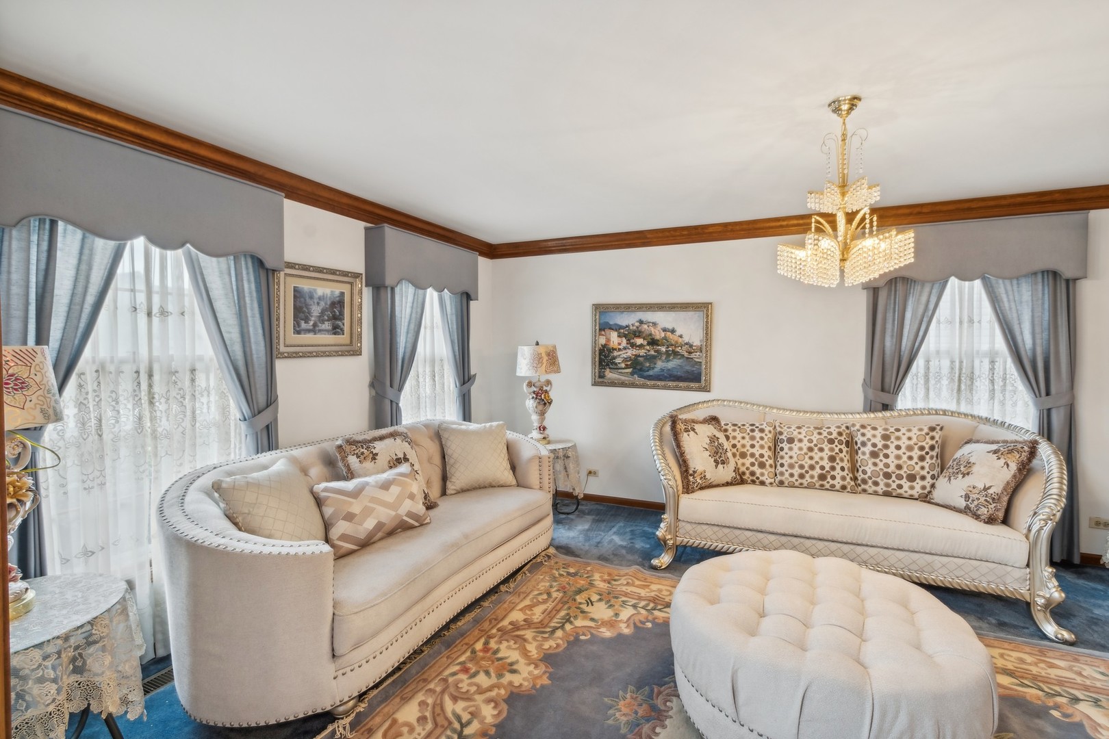 1605 Charlemagne Drive Hoffman Estates, IL 60192 - Photo 6 of 29 a living room with furniture and a large window