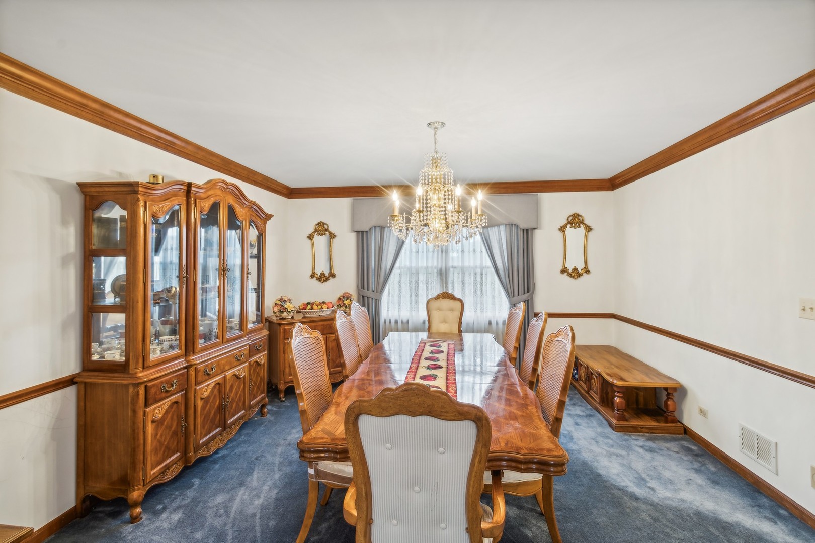 1605 Charlemagne Drive Hoffman Estates, IL 60192 - Photo 7 of 29 a view of a dining room with furniture window and wooden floor