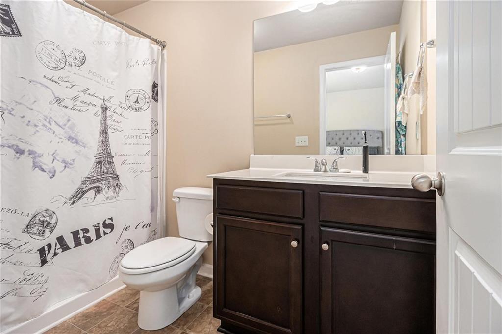 6148 Oakley Road, Unit 23 Union City, GA 30291 - Photo 18 of 26 a bathroom with a sink and a toilet