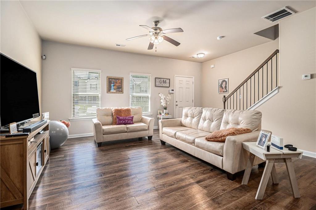 6148 Oakley Road, Unit 23 Union City, GA 30291 - Photo 6 of 26 a living room with furniture and a flat screen tv