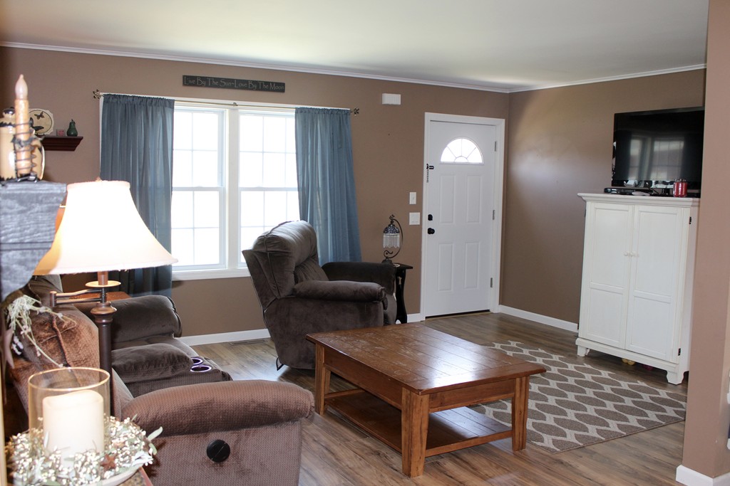 1645 Main Road Granville, MA 01034 - Photo 5 of 20 a living room with furniture and a window