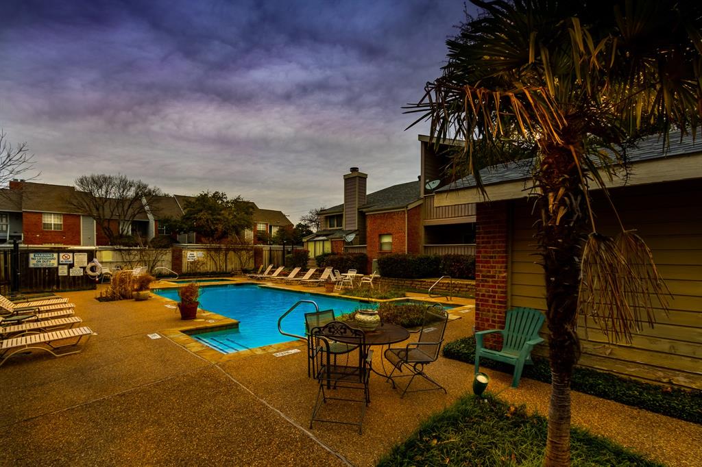2100 Randy Snow Road, Unit 412 Arlington, TX 76011 - Photo 3 of 32 a view of swimming pool with outdoor seating and city view