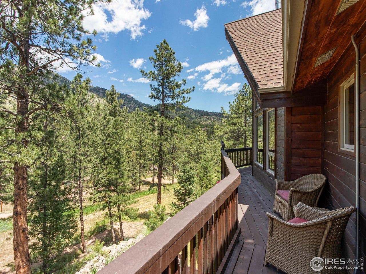 287 Wichita Road Lyons, CO 80540 - Photo 12 of 40 a balcony with next to a yard