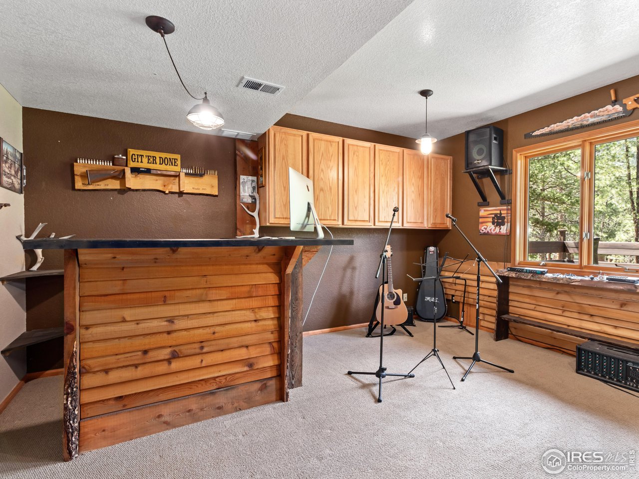 287 Wichita Road Lyons, CO 80540 - Photo 27 of 40 a view of room with furniture and windows