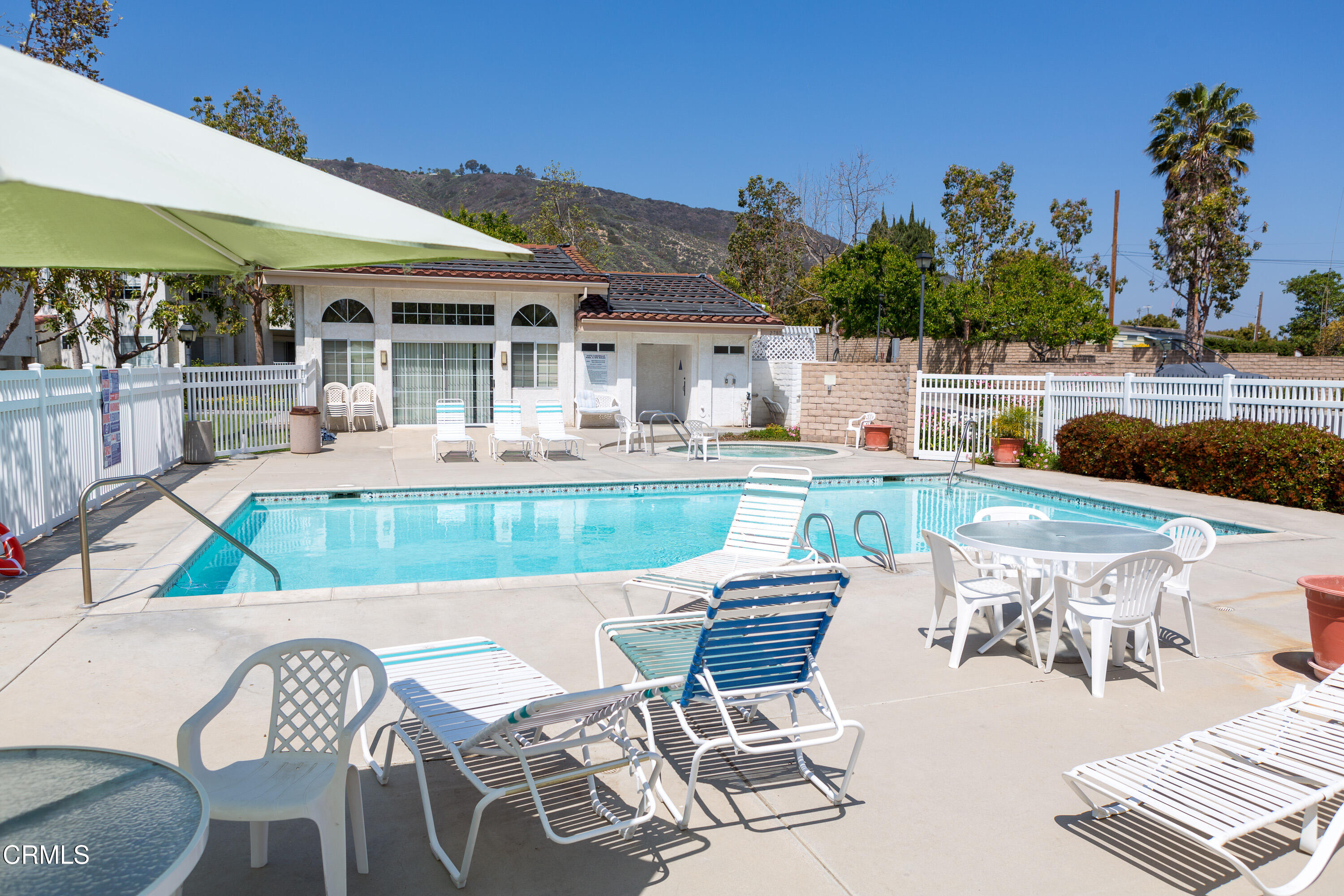 2913 Antonio Drive, Unit 106 Camarillo, CA 93010 - Photo 13 of 14 a swimming pool with outdoor seating and yard
