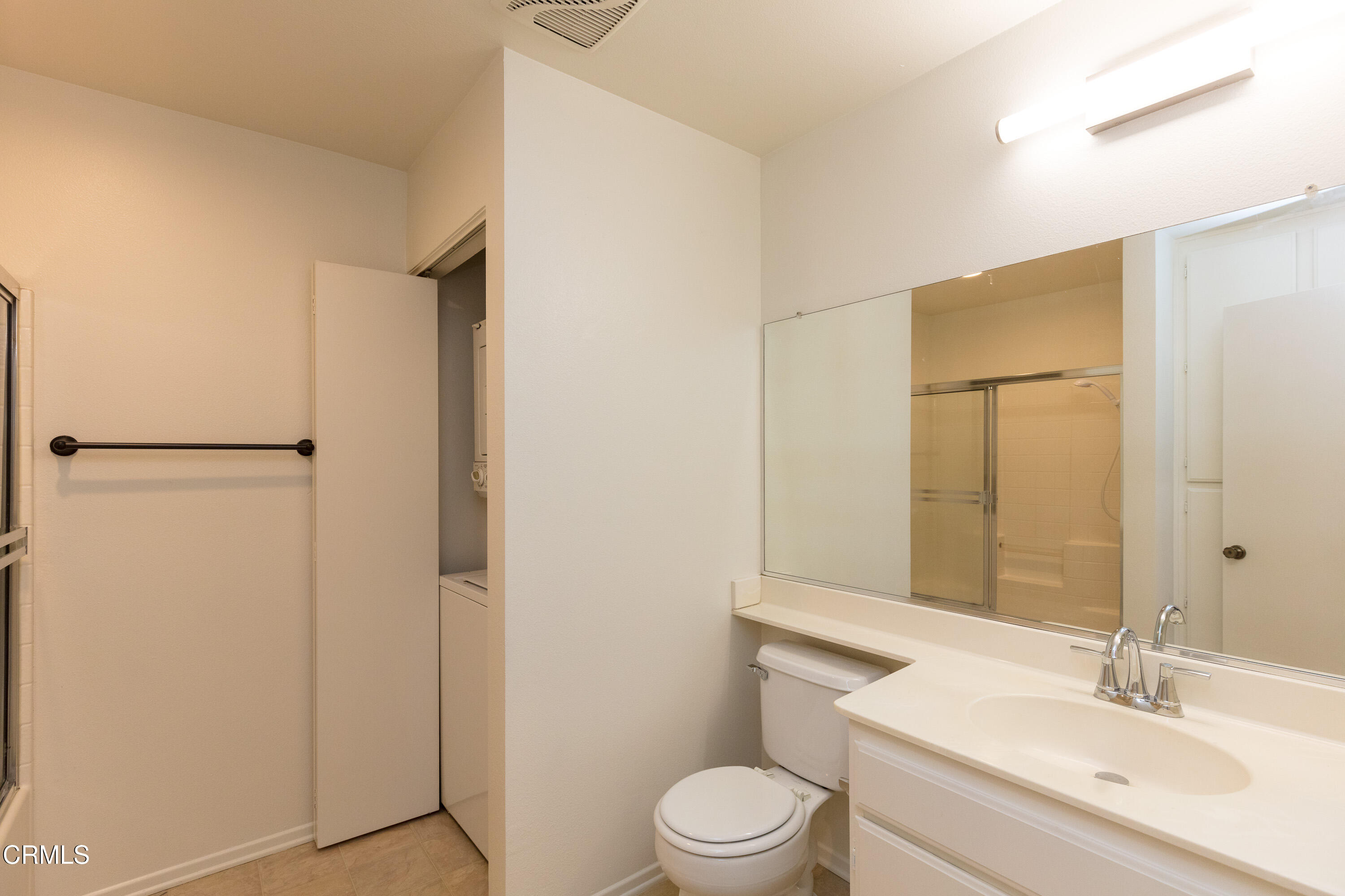 2913 Antonio Drive, Unit 106 Camarillo, CA 93010 - Photo 9 of 14 a bathroom with a sink a toilet and shower