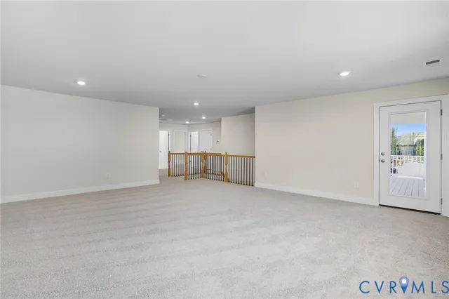 a bathroom with a shower sink and mirror
