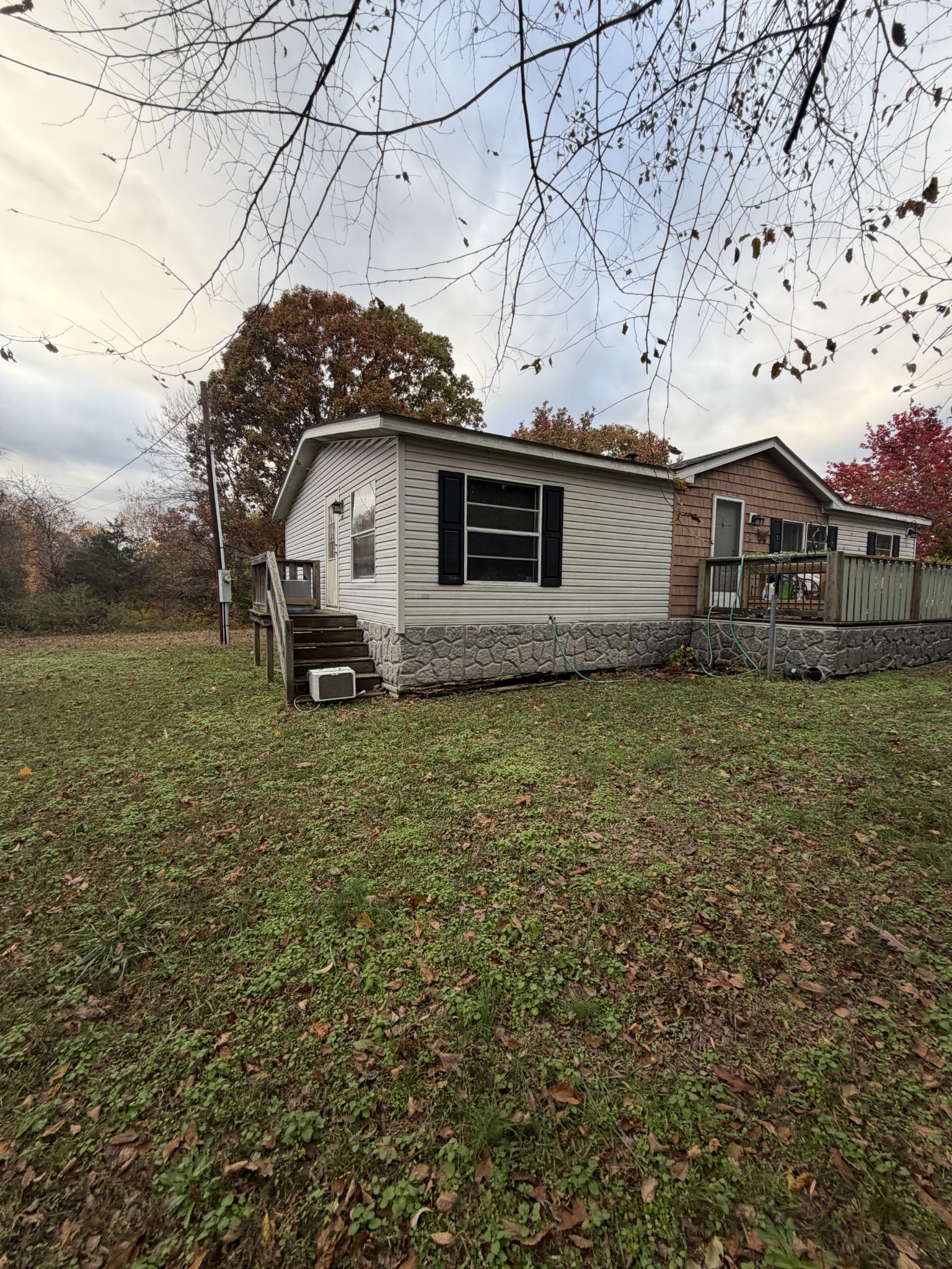 2749 Highway 47 White Bluff, TN 37187 - Photo 3 of 4 a front view of a house with a garden