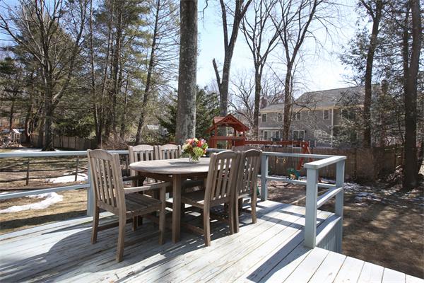 27 Haven Road Wellesley, MA 02481 - Photo 9 of 10 a view of a patio with table and chairs and wooden floor