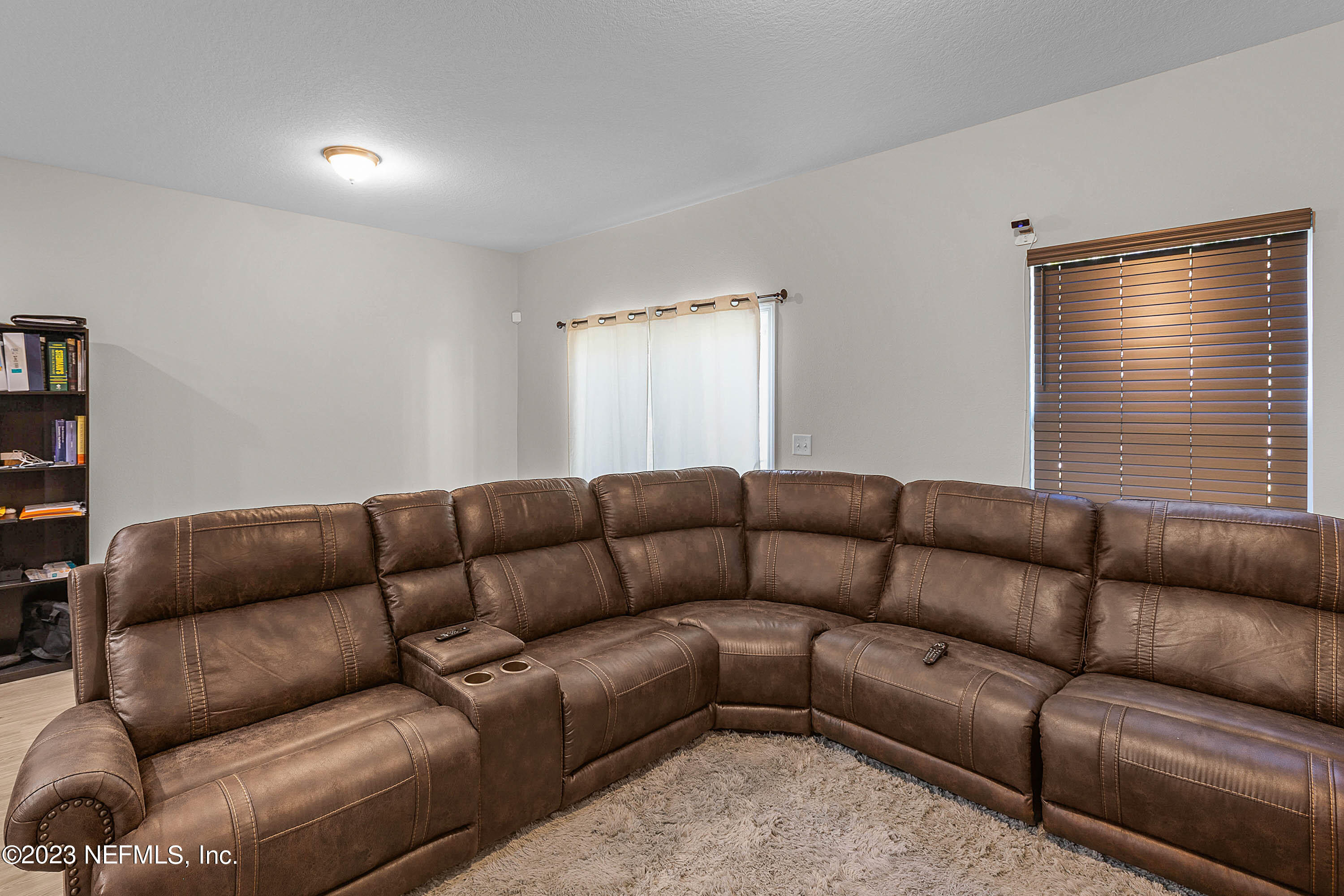 742 Talking Tree Drive Jacksonville, FL 32205 - Photo 12 of 23 Living Room/Backdoor
