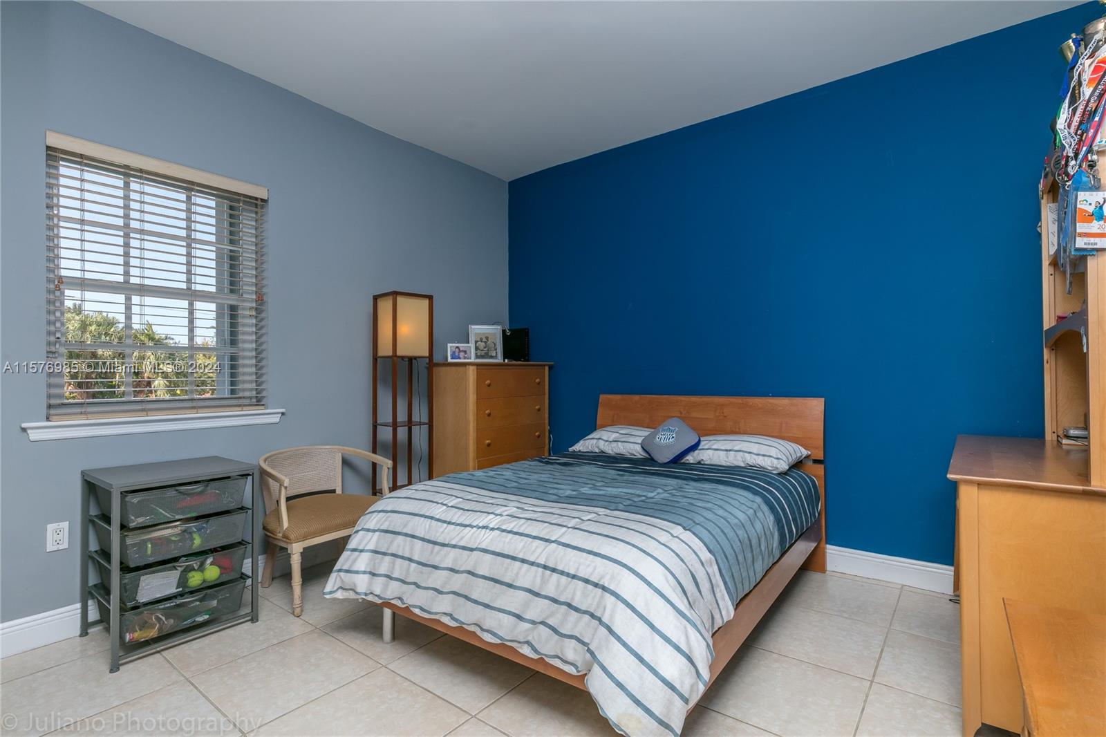 444 Fernwood Road, Unit 444 Key Biscayne, FL 33149 - Photo 27 of 28 a bedroom with a bed and dresser