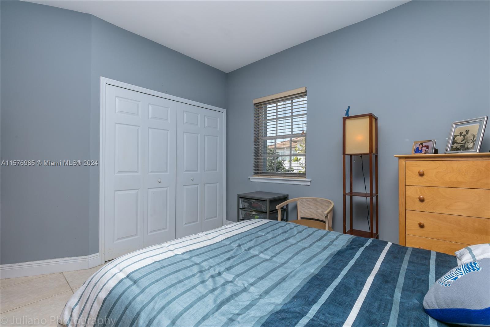 444 Fernwood Road, Unit 444 Key Biscayne, FL 33149 - Photo 28 of 28 a bedroom with a bed and a dresser in it