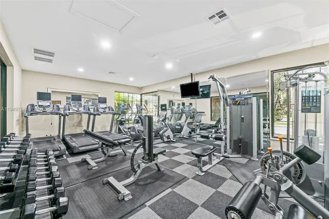 a view of a room with gym equipment