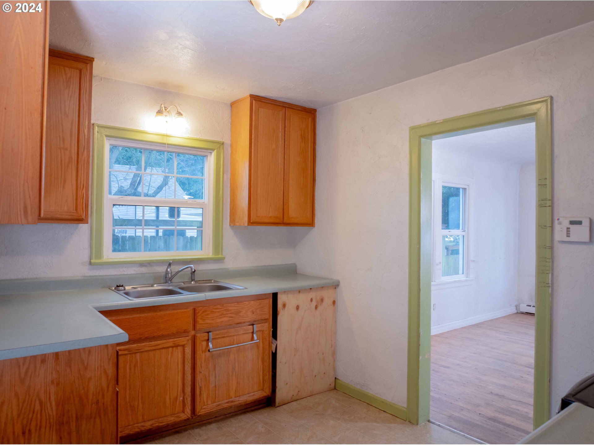 2947 Elmira Road Eugene, OR 97402 - Photo 11 of 29 a bathroom with a sink double vanity and a mirror
