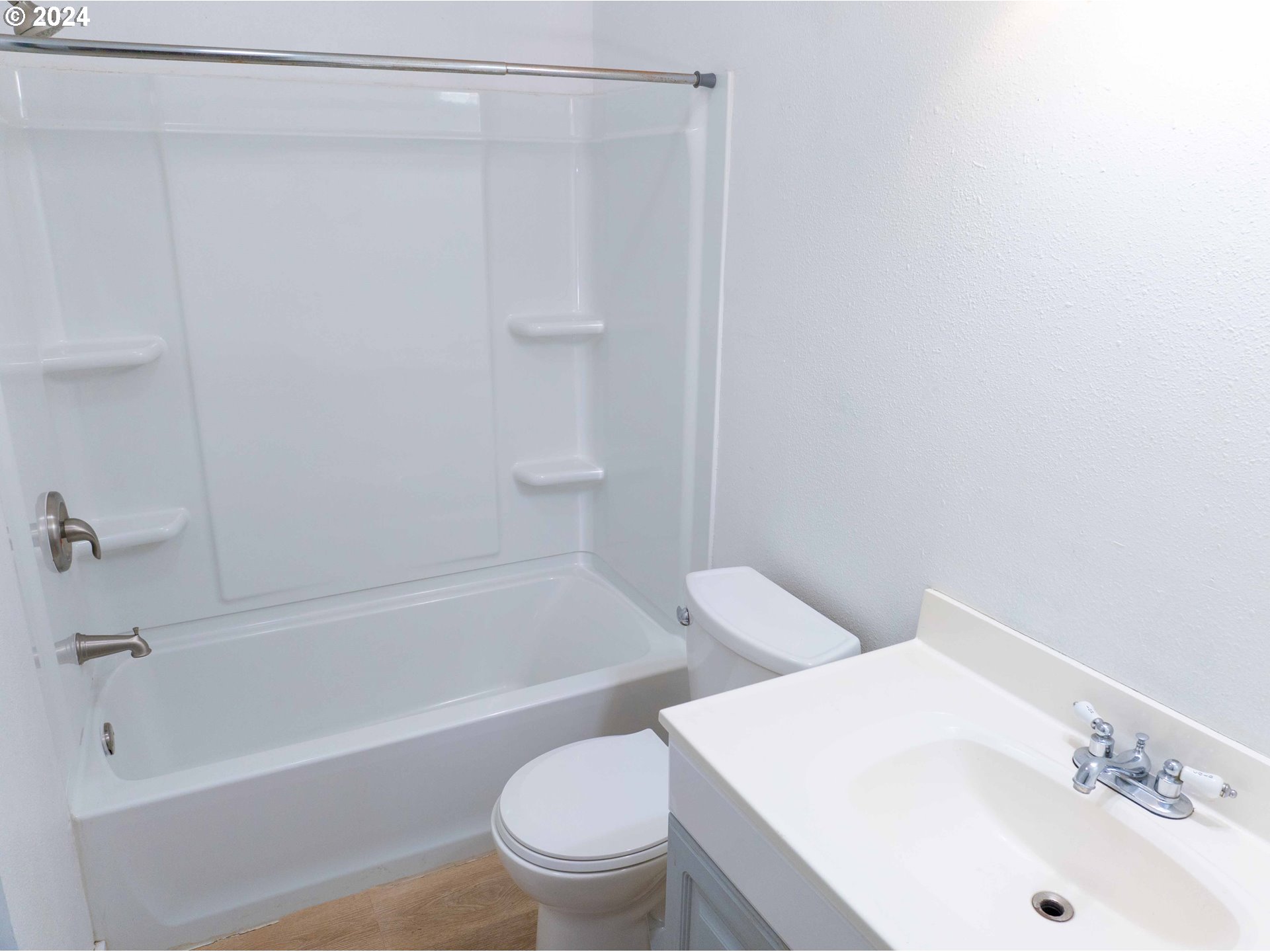 2947 Elmira Road Eugene, OR 97402 - Photo 15 of 29 a bathroom with a sink a toilet and a bathtub