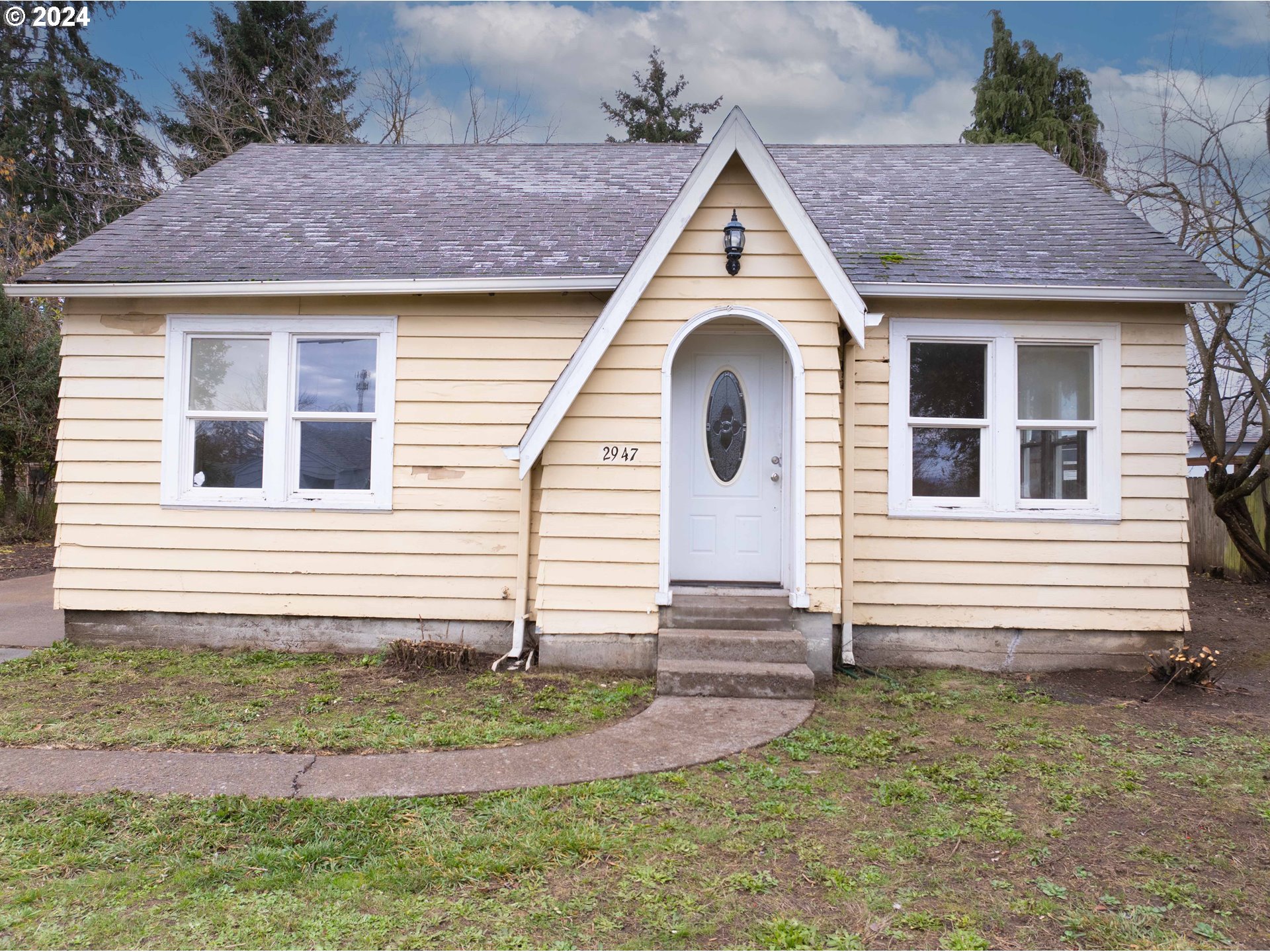 2947 Elmira Road Eugene, OR 97402 - Photo 2 of 29 a view of a house with a yard