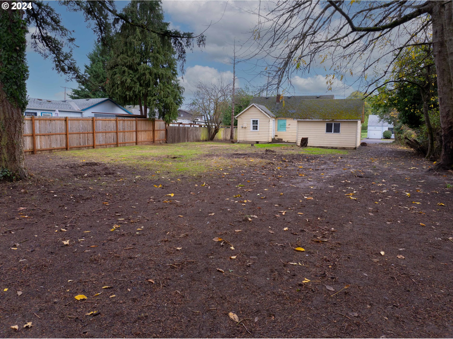 2947 Elmira Road Eugene, OR 97402 - Photo 24 of 29 a view of a house with backyard and tree