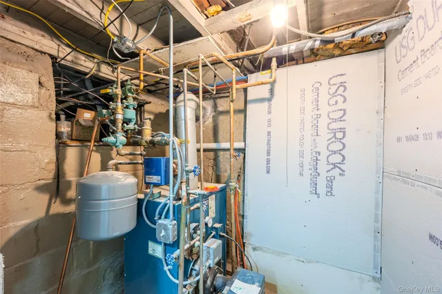 a view of a house with a yard and deck