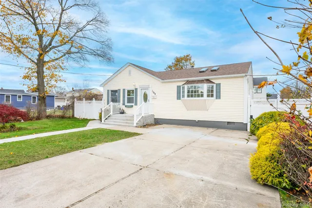 a picture of a park with a bench