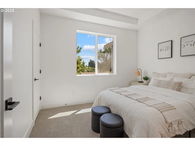 a view of a backyard with wooden fence
