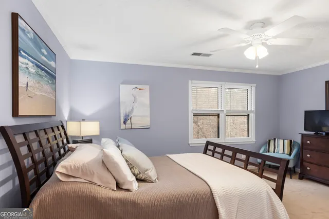 a bathroom with a sink a mirror a toilet and a mirror