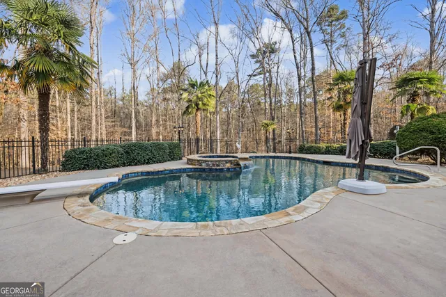 a view of entryway with wooden floor and stairs