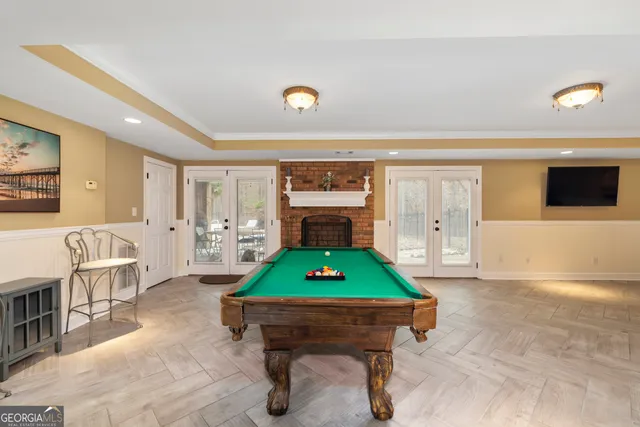 a view of a swimming pool with a house