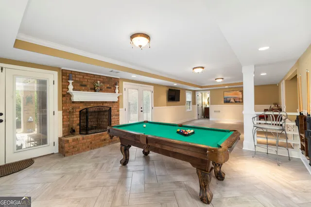 a view of a swimming pool with a patio