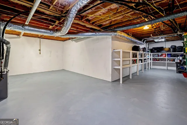 an aerial view of a house with outdoor space