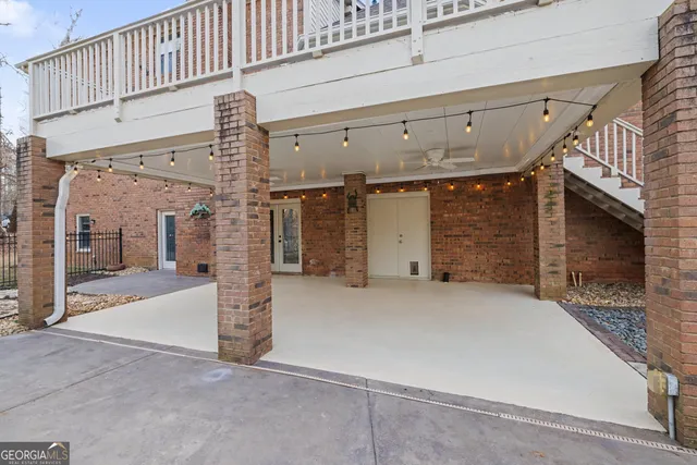 an aerial view of houses with yard