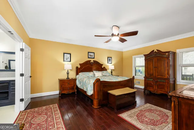 a bed room with a bed and a chandelier