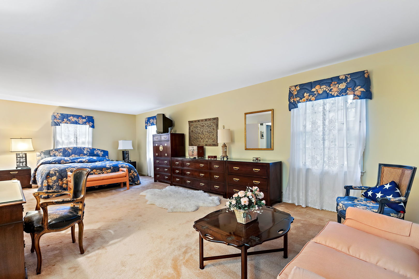1369 Tower Road Winnetka, IL 60093 - Photo 16 of 31 a bedroom with furniture and a lamp