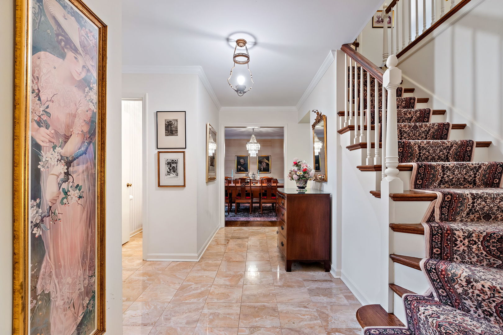 1369 Tower Road Winnetka, IL 60093 - Photo 2 of 31 a living room with furniture and a chandelier