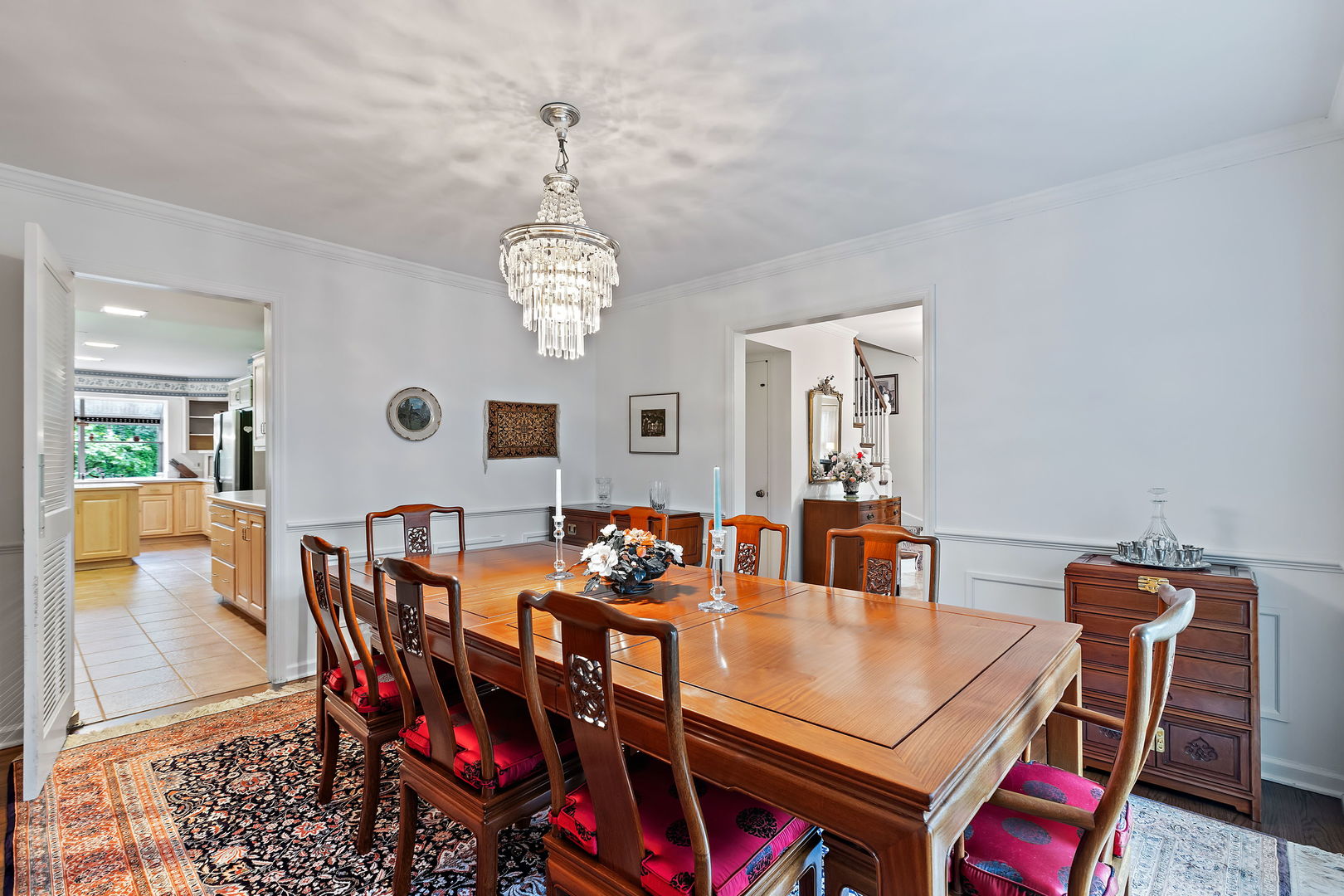 1369 Tower Road Winnetka, IL 60093 - Photo 6 of 31 a view of a dining room with furniture and chandelier
