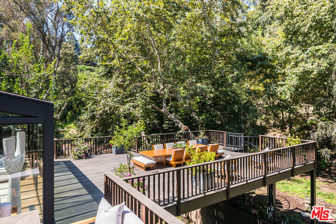 681 Brooktree Road Santa Monica, CA 90402 - Photo 22 of 33 a view of a balcony with wooden floor