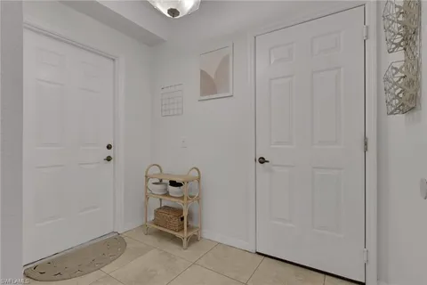 a room that has a closet and wooden floor