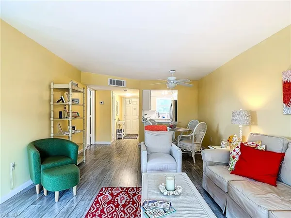 a living room with furniture and a table