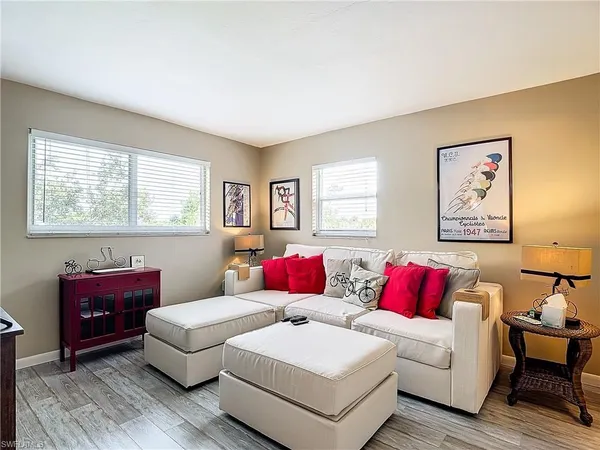 a living room with furniture and a couch