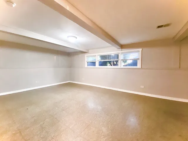 en empty room with windows