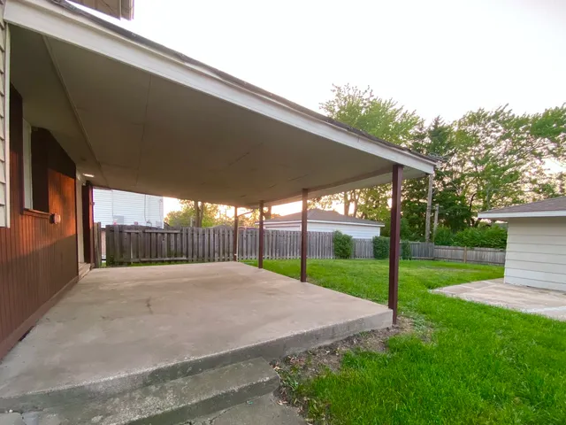 a view of swimming pool with a yard