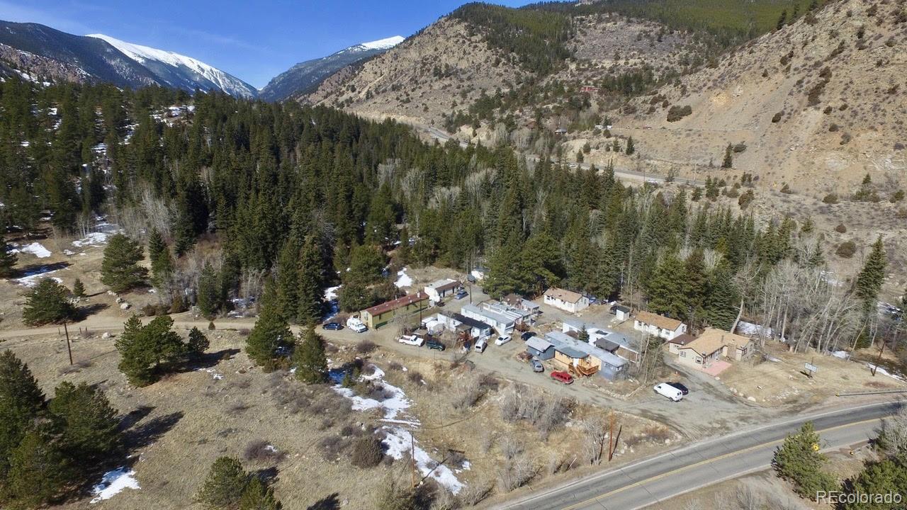 275 Junction Loop Road Empire, CO 80438 - Photo 18 of 18 a view of a backyard of the house
