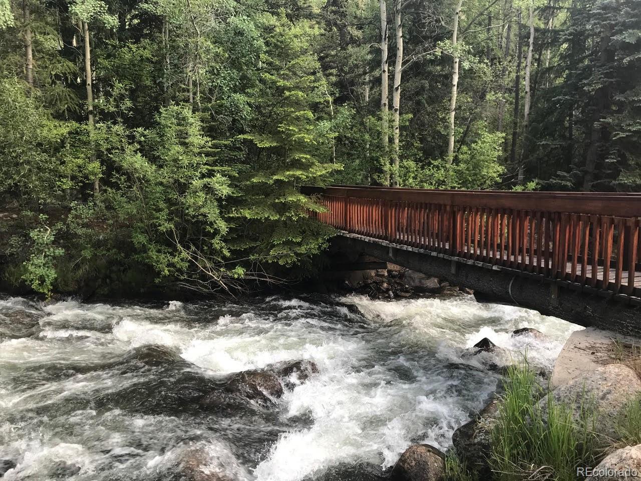 275 Junction Loop Road Empire, CO 80438 - Photo 10 of 18 a view of wooden fence of a house
