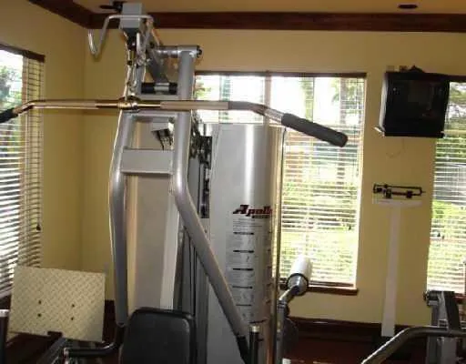 a view of a living room with furniture and a window