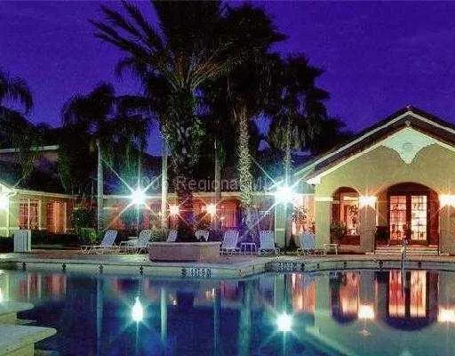 a view of a house with swimming pool
