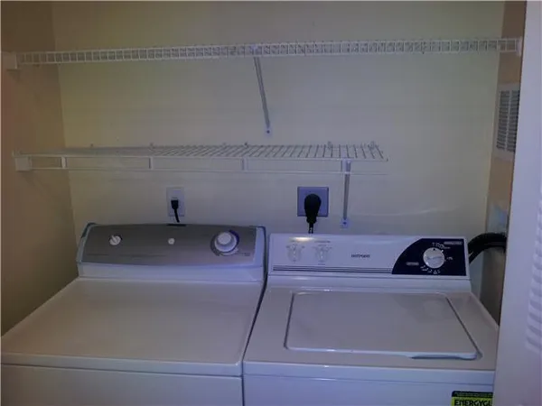 a bathroom with a sink and vanity