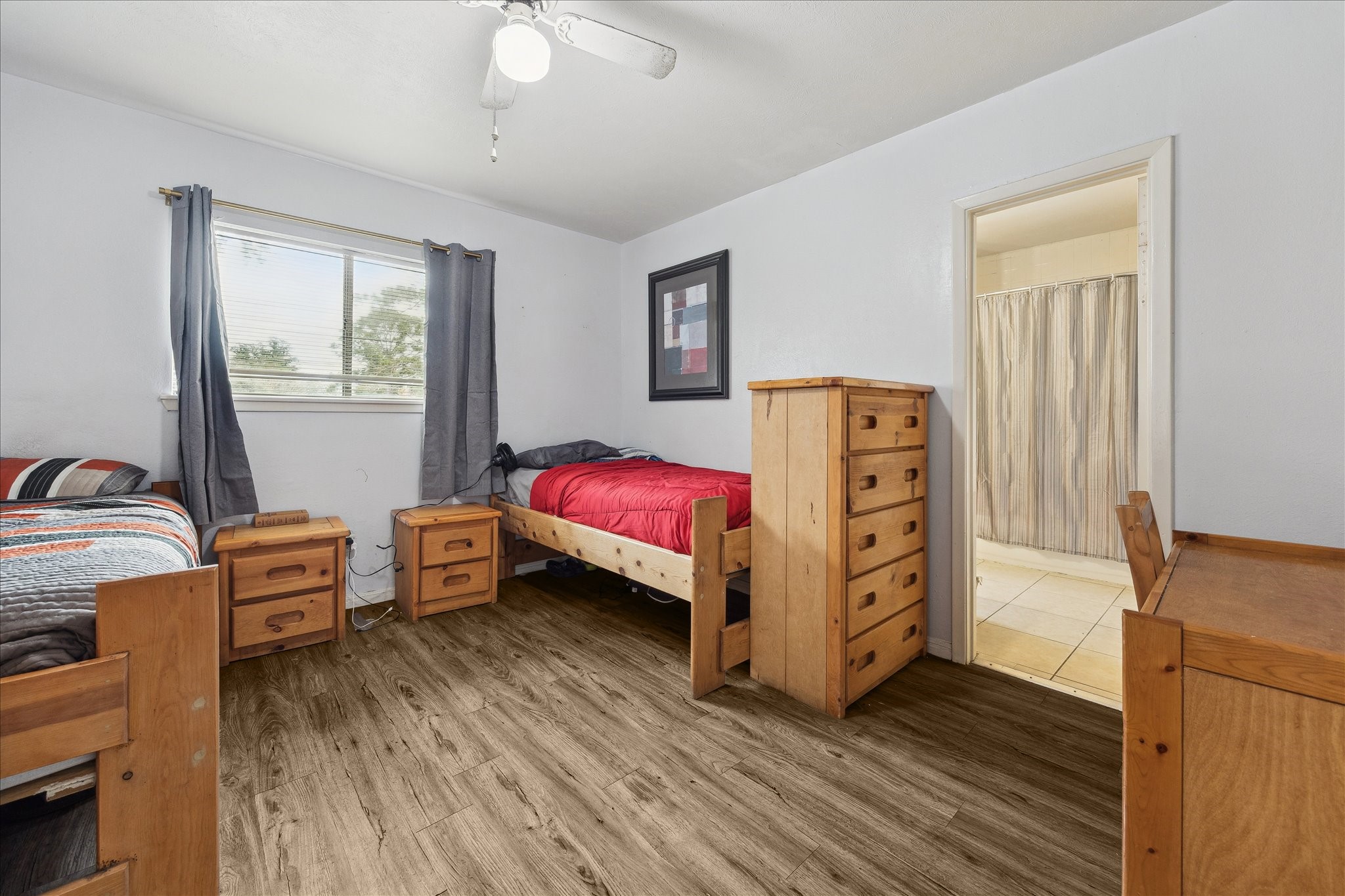 240 West 23rd Street Houston, TX 77008 - Photo 25 of 31 a bedroom with furniture and a window
