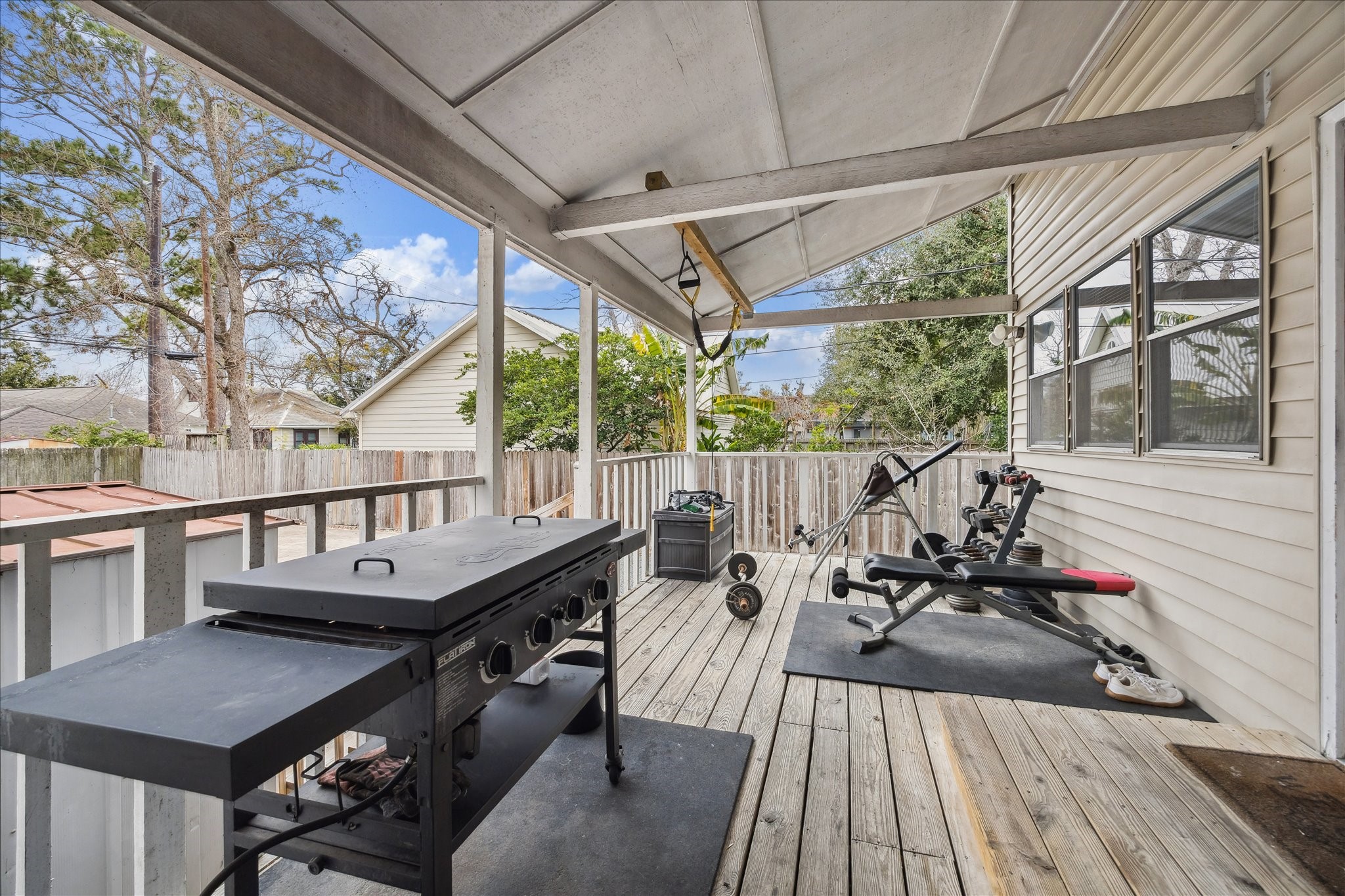 240 West 23rd Street Houston, TX 77008 - Photo 10 of 31 a view of balcony with wooden floor and outdoor seating