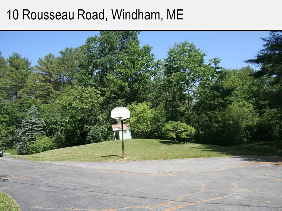 10 Rousseau Road Windham, ME 04062 - Photo 27 of 31 Large open paved driveway with...