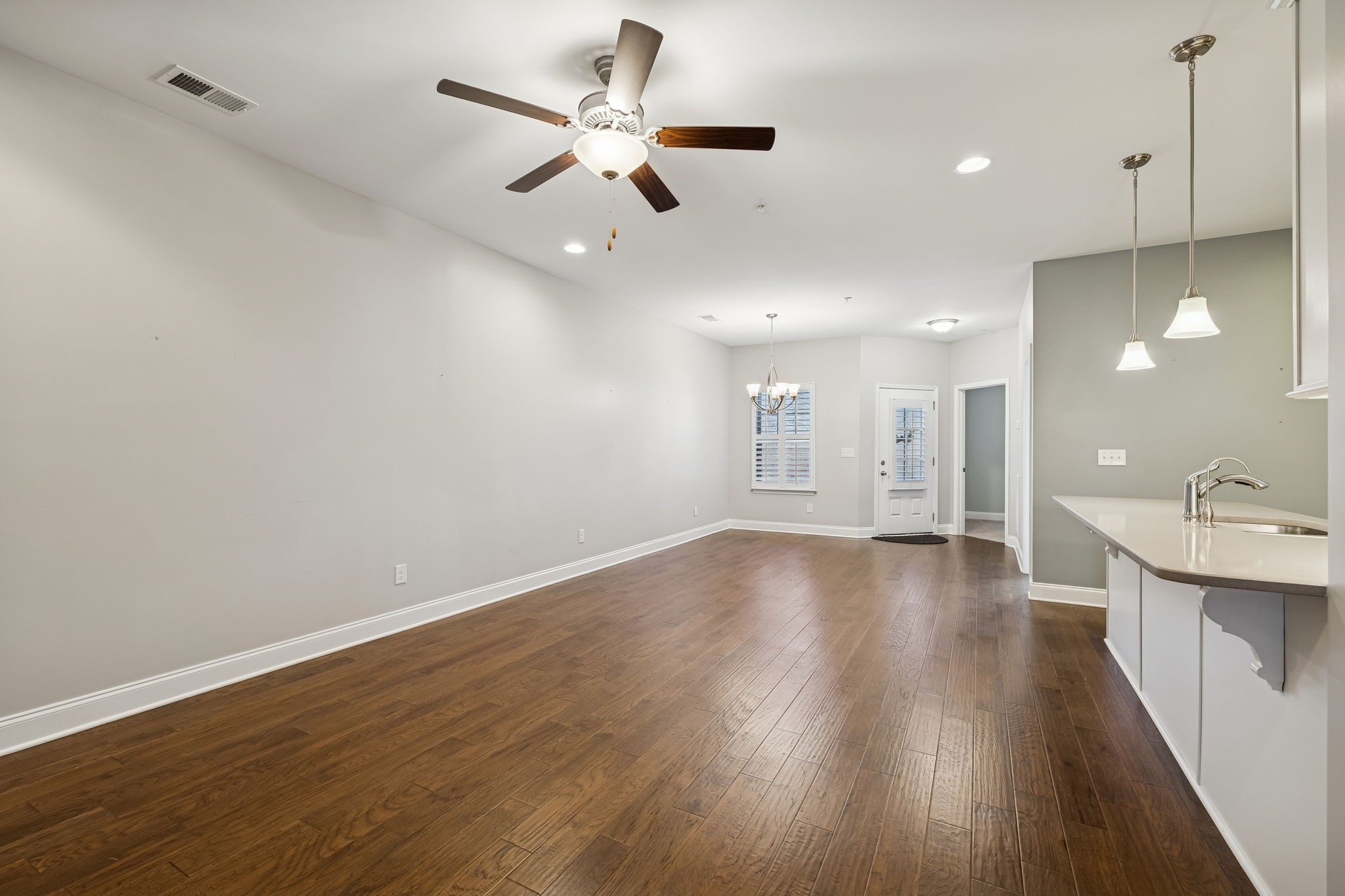 352 Buckner Cir Mount Mount Juliet, TN 37122 - Photo 12 of 51 an empty room with wooden floor and windows