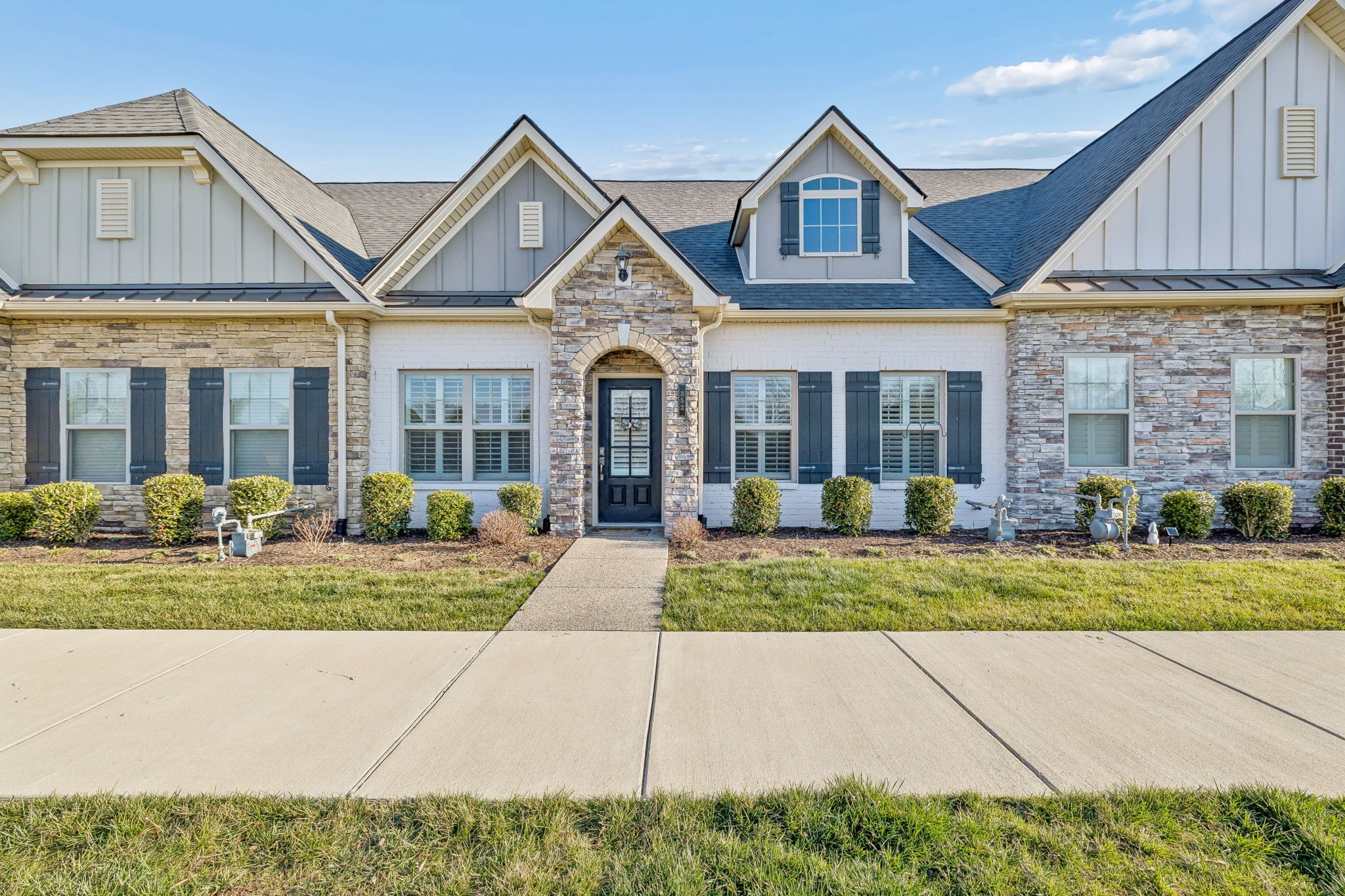352 Buckner Cir Mount Mount Juliet, TN 37122 - Photo 2 of 51 a front view of a house with garden